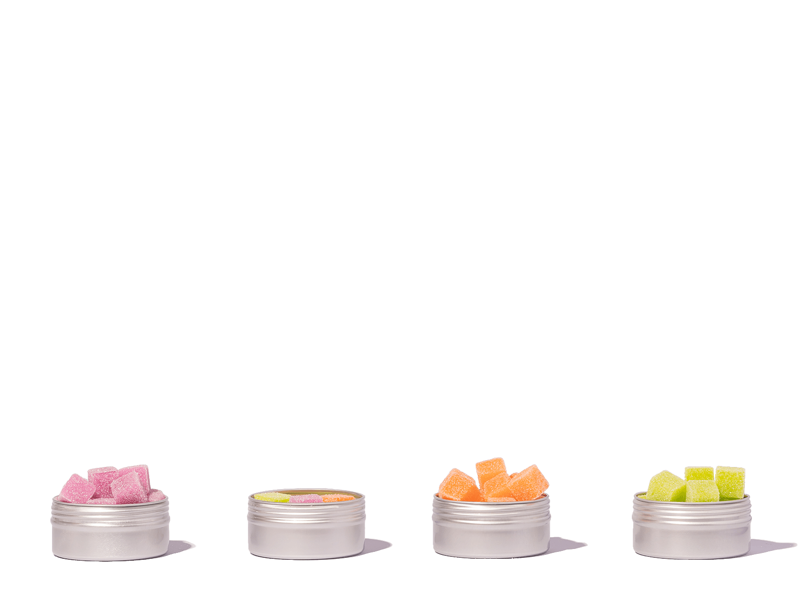 Four Open Tins of Gummy Candy